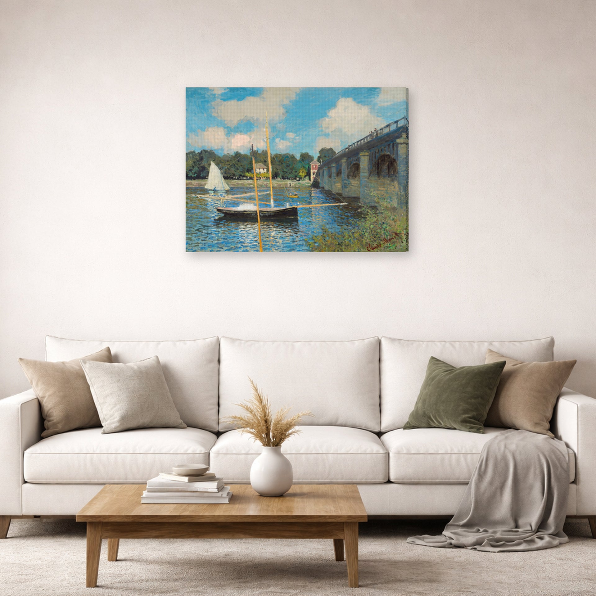 Gallery-wrapped canvas print of Claude Monet's 'The Bridge at Argenteuil' displayed on a wall in a living room