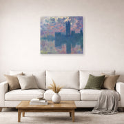 Unframed poster print of Claude Monet's 'The Houses of Parliament, Sunset' displayed on a wall in a living room