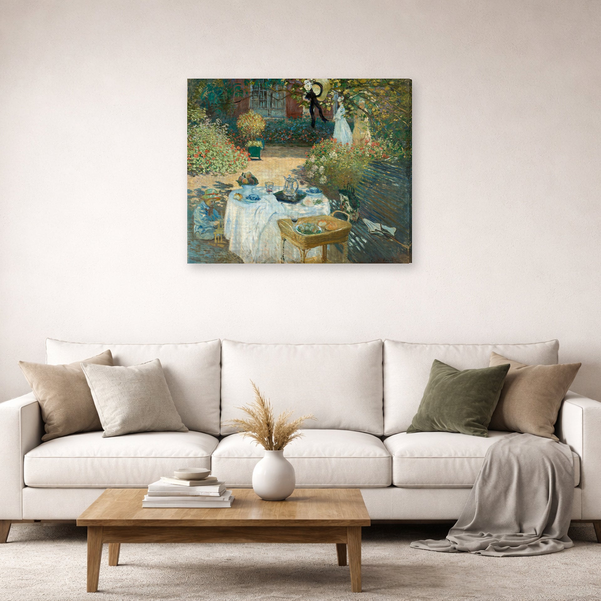 Gallery-wrapped canvas print of Claude Monet's 'The Luncheon, Monet's Garden at Argenteuil' displayed on a wall in a living room