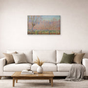Gallery-wrapped canvas print of Claude Monet's 'The Willows' displayed on a wall in a living room