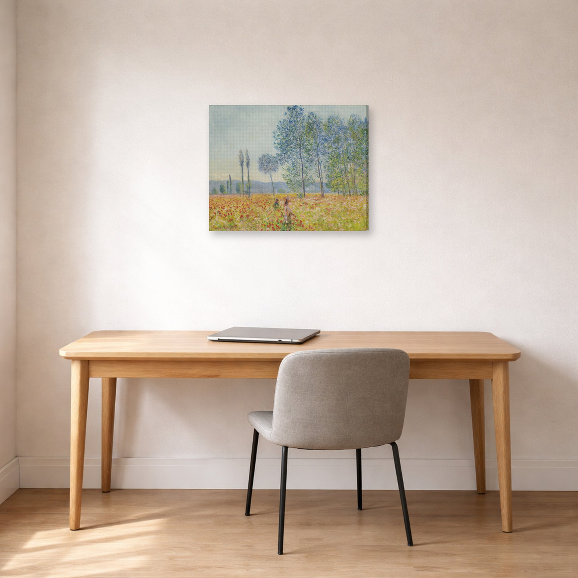 Gallery-wrapped canvas print of Claude Monet's 'Under the Poplar' displayed on a wall in a office