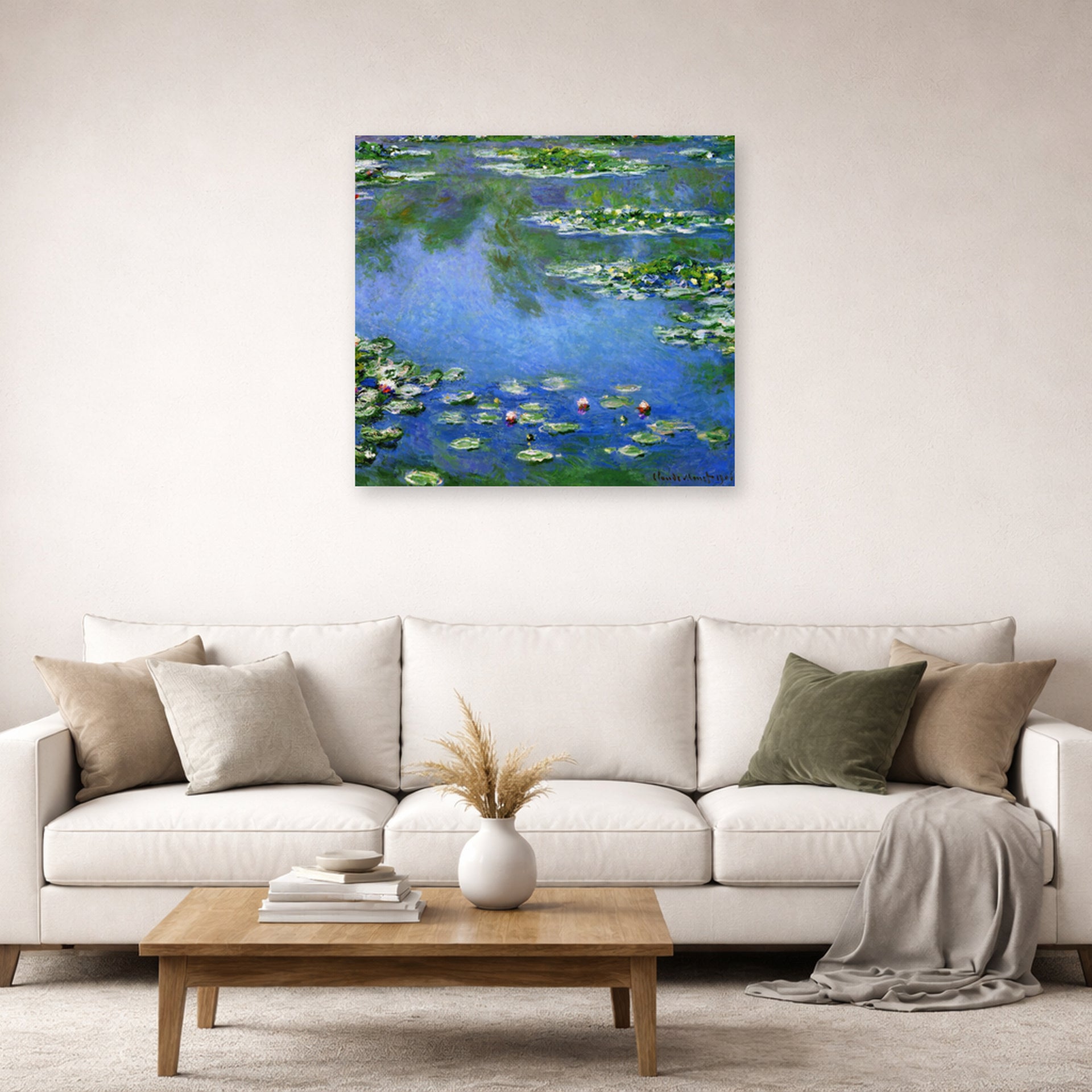 Unframed poster print of Claude Monet's 'Water Lilies' displayed on a wall in a living room