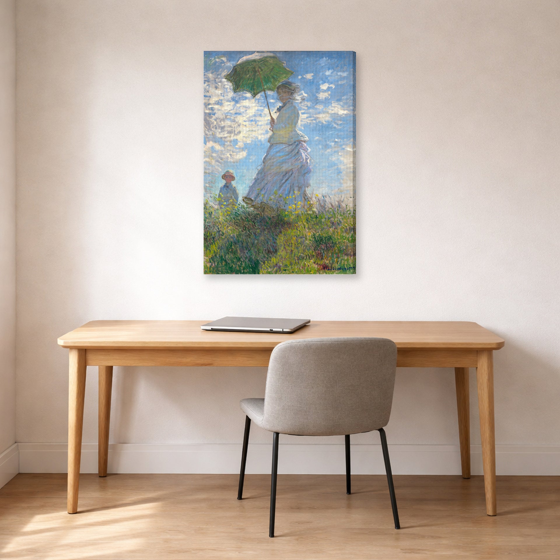Gallery-wrapped canvas print of Claude Monet's 'Woman with a Parasol' displayed on a wall in a office