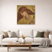 Unframed poster print of Dante Gabriel Rossetti's Sancta Lilias displayed on a wall in a living room