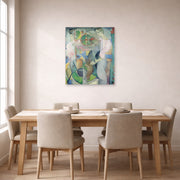 Unframed poster print of Diego Rivera's Woman at a Well displayed on a wall in a dining room