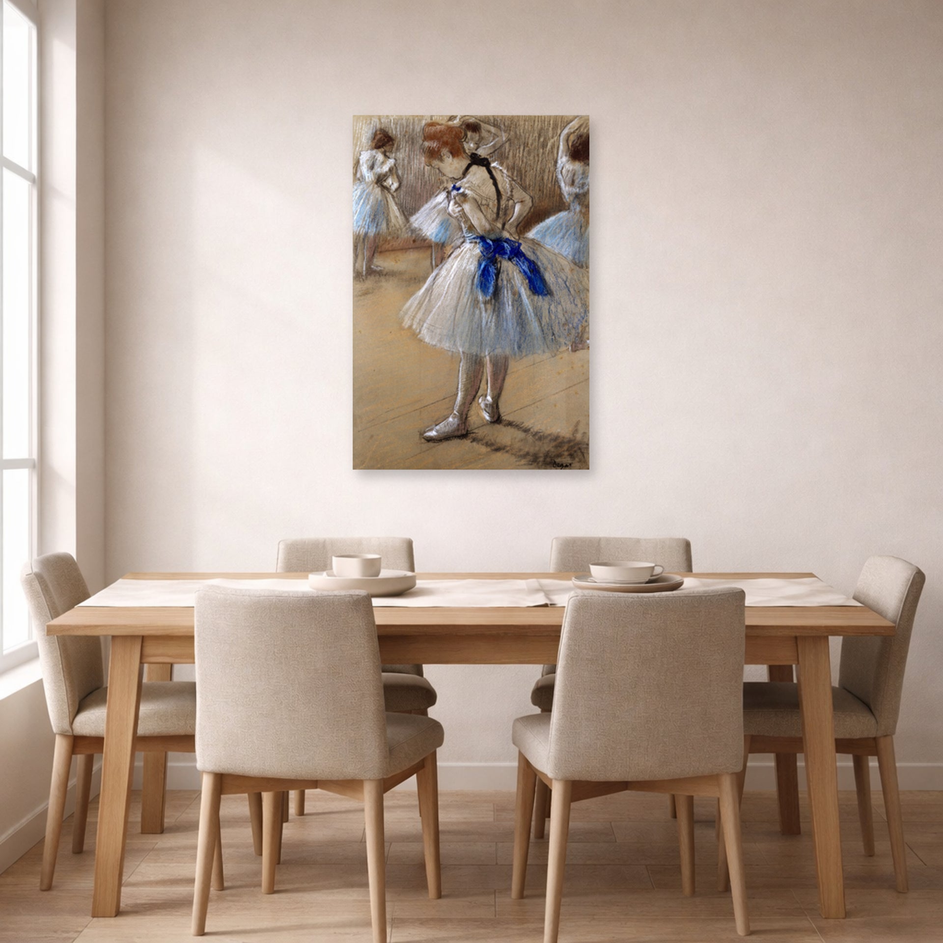 Unframed poster print of Edgar Degas's A Study of a Dancer displayed on a wall in a dining