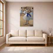 Unframed poster print of Edgar Degas's A Study of a Dancer displayed on a wall in a living room