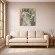 Unframed poster print of Edgar Degas's After the Bath Woman Drying displayed on a wall in a living room