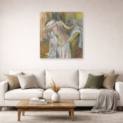 Unframed poster print of Edgar Degas's After the Bath Woman Drying displayed on a wall in a living room