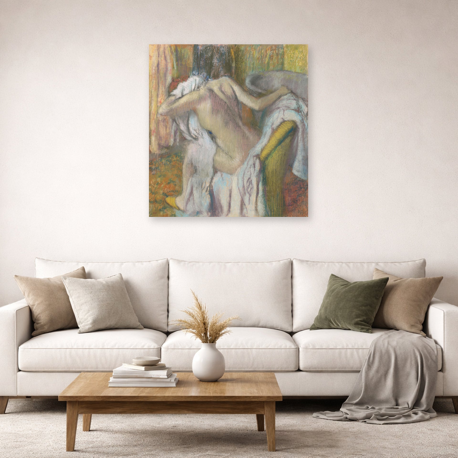 Unframed poster print of Edgar Degas's After the Bath Woman Drying displayed on a wall in a living room