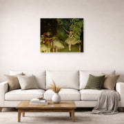 Unframed poster print of Edgar Degas's Ballet Rehearsal displayed on a wall in a living room