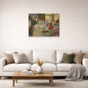 Unframed poster print of Edgar Degas's Ballet School displayed on a wall in a living room