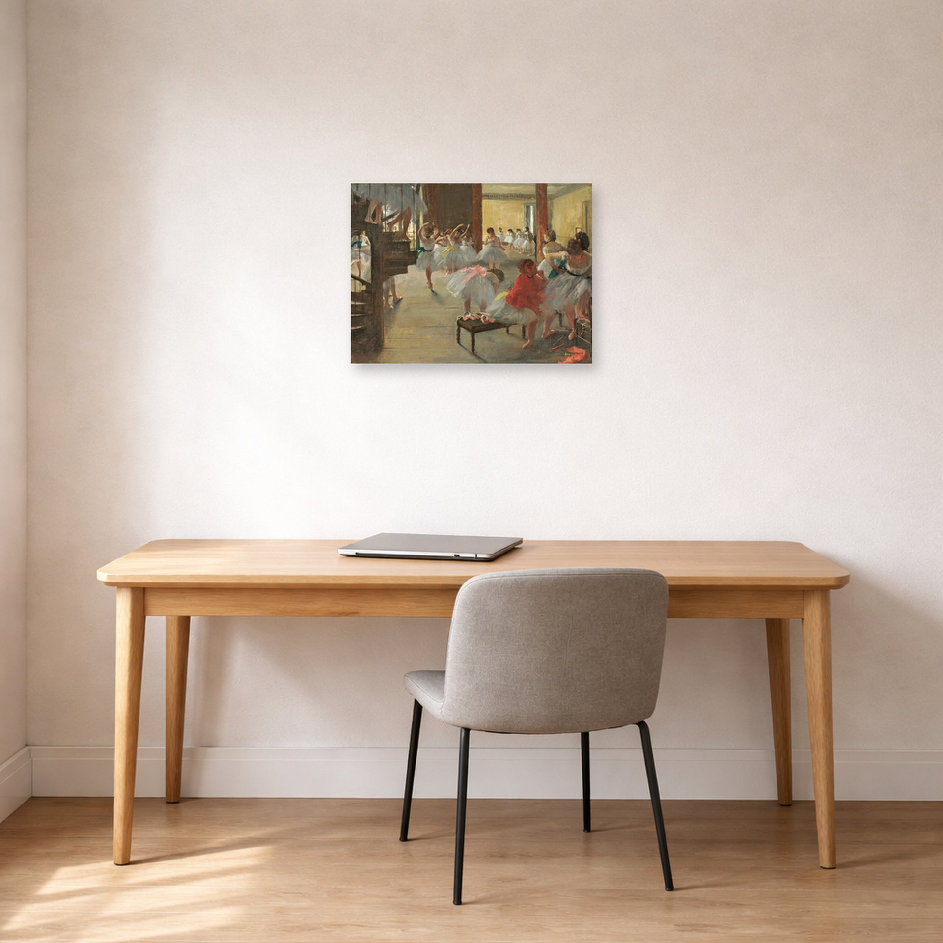 Unframed poster print of Edgar Degas's Ballet School displayed on a wall in a office