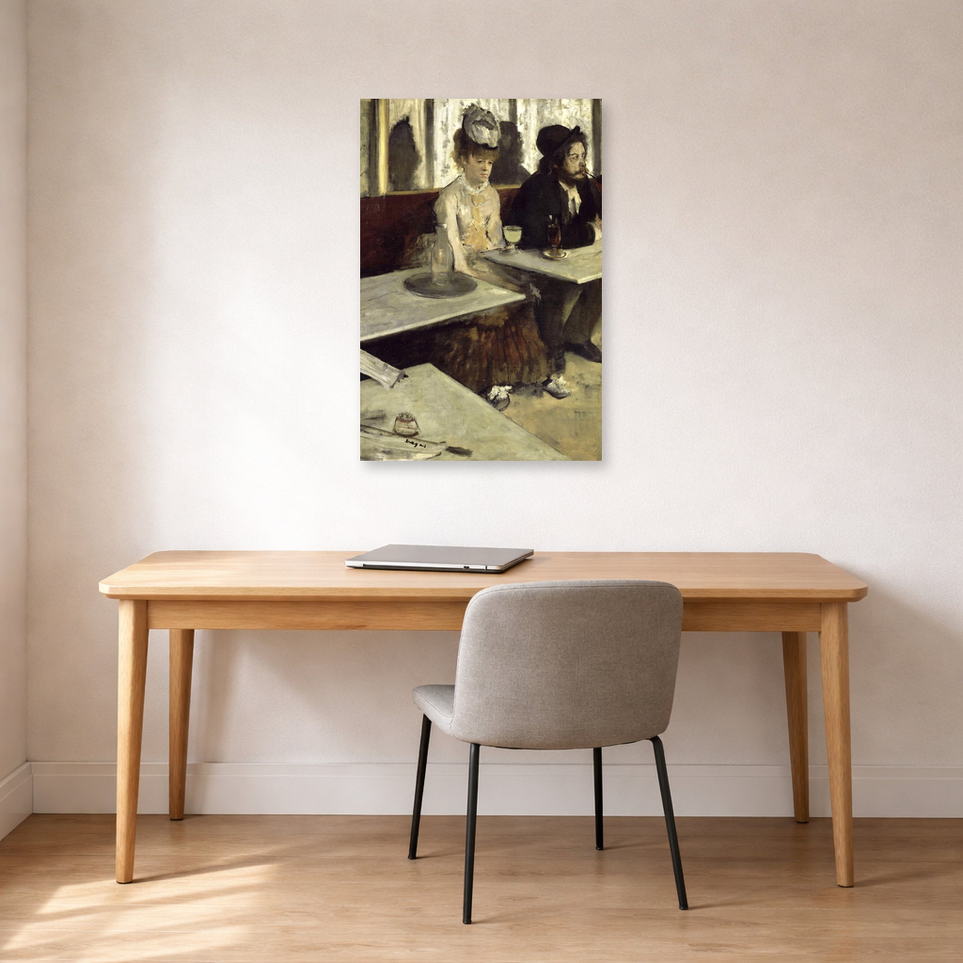 Unframed poster print of Edgar Degas's Labsinthe displayed on a wall in a office