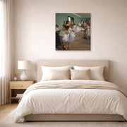 Gallery-wrapped canvas print of Edgar Degas's The Dance Class displayed on a wall in a bedroom