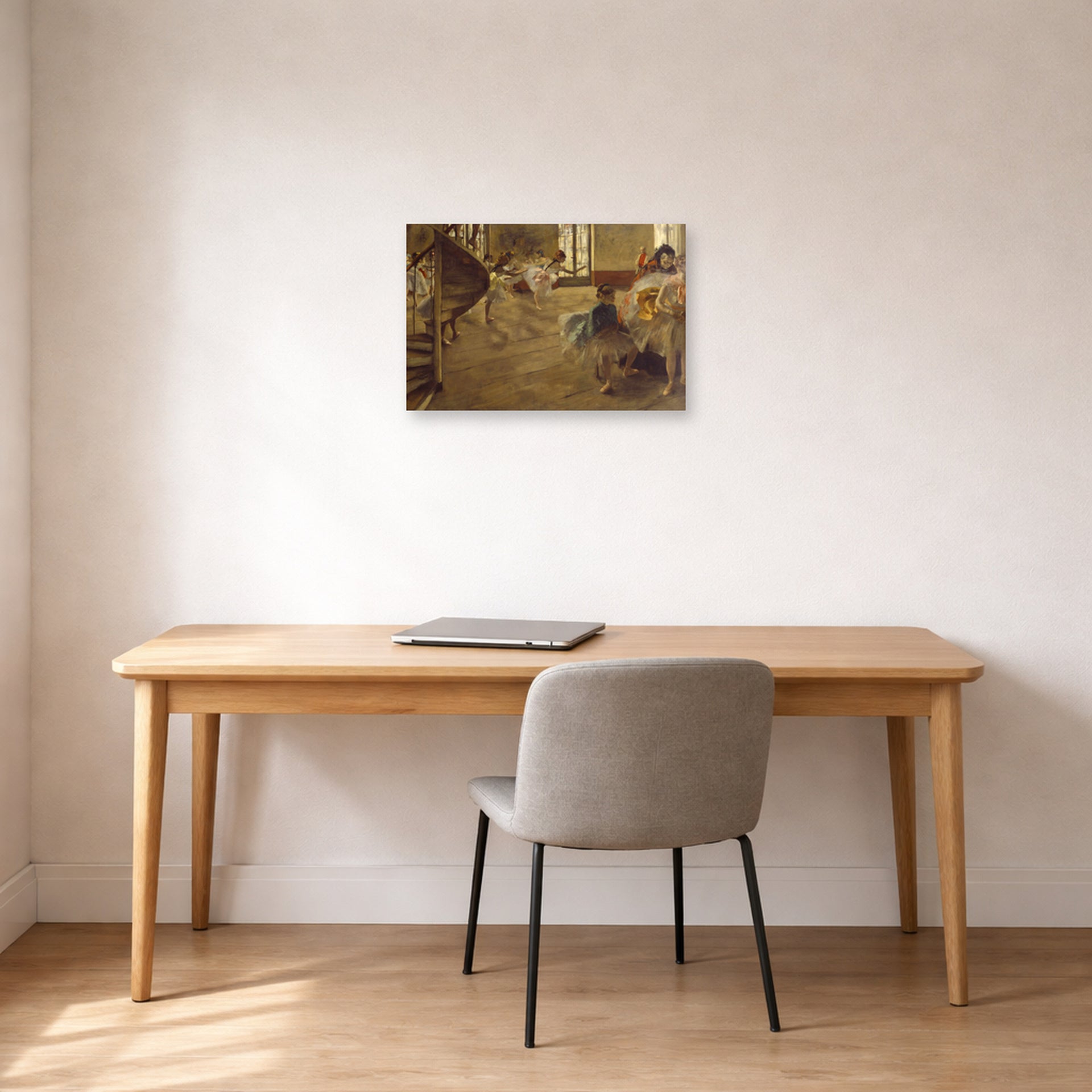 Unframed poster print of Edgar Degas's The Rehearsal displayed on a wall in a office