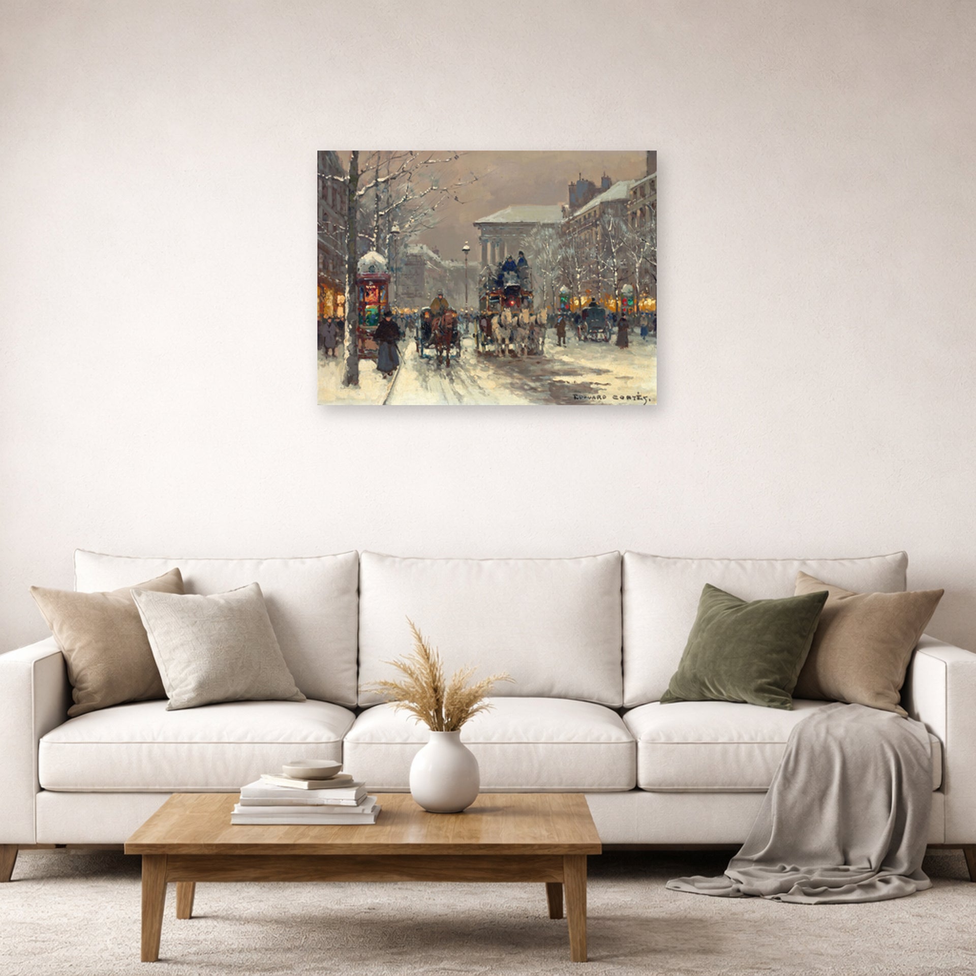 Unframed poster print of Édouard Cortès's Boulevard de la Madeleine displayed on a wall in a living room