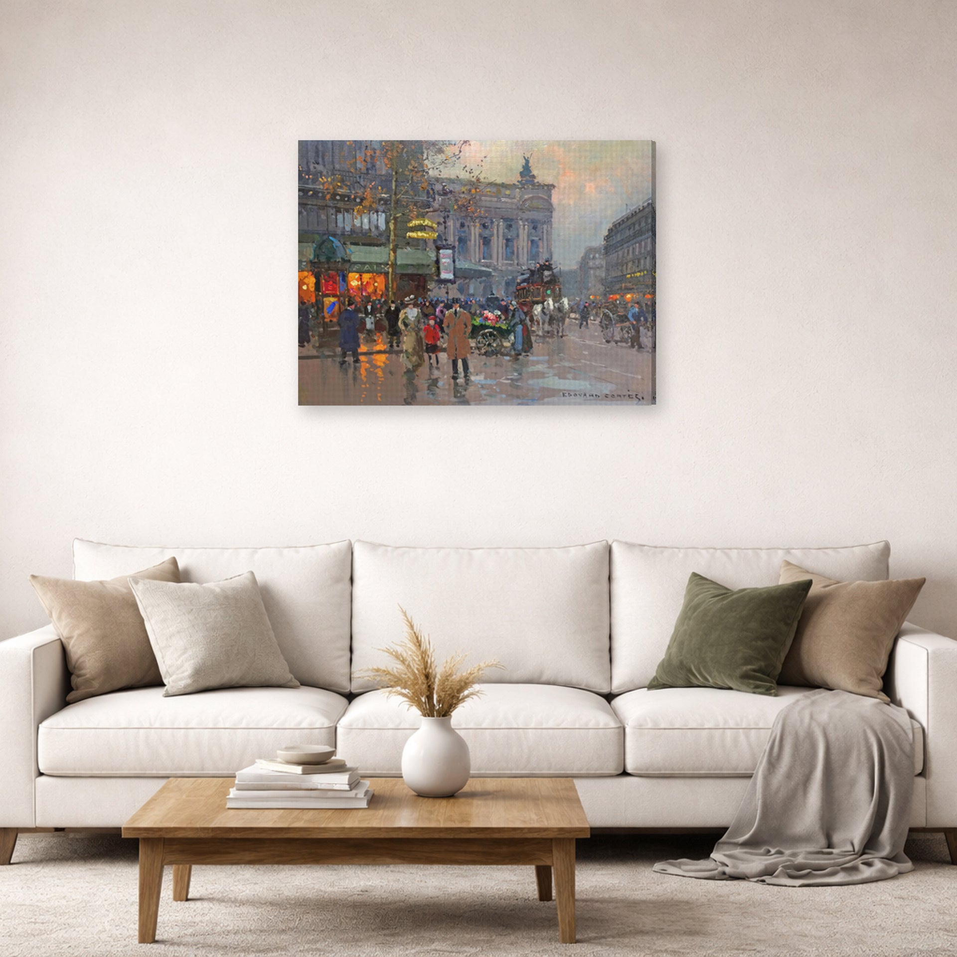 Gallery-wrapped canvas print of Édouard Cortès's Cafe de la paix displayed on a wall in a living room