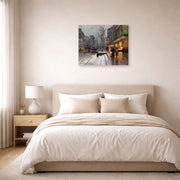 Gallery-wrapped canvas print of Édouard Cortès's Porte St. Martin displayed on a wall in a bedroom