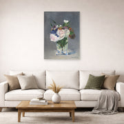 Unframed poster print of Edouard Manet's 'Flowers in a Crystal Vase' displayed on a wall in a living room