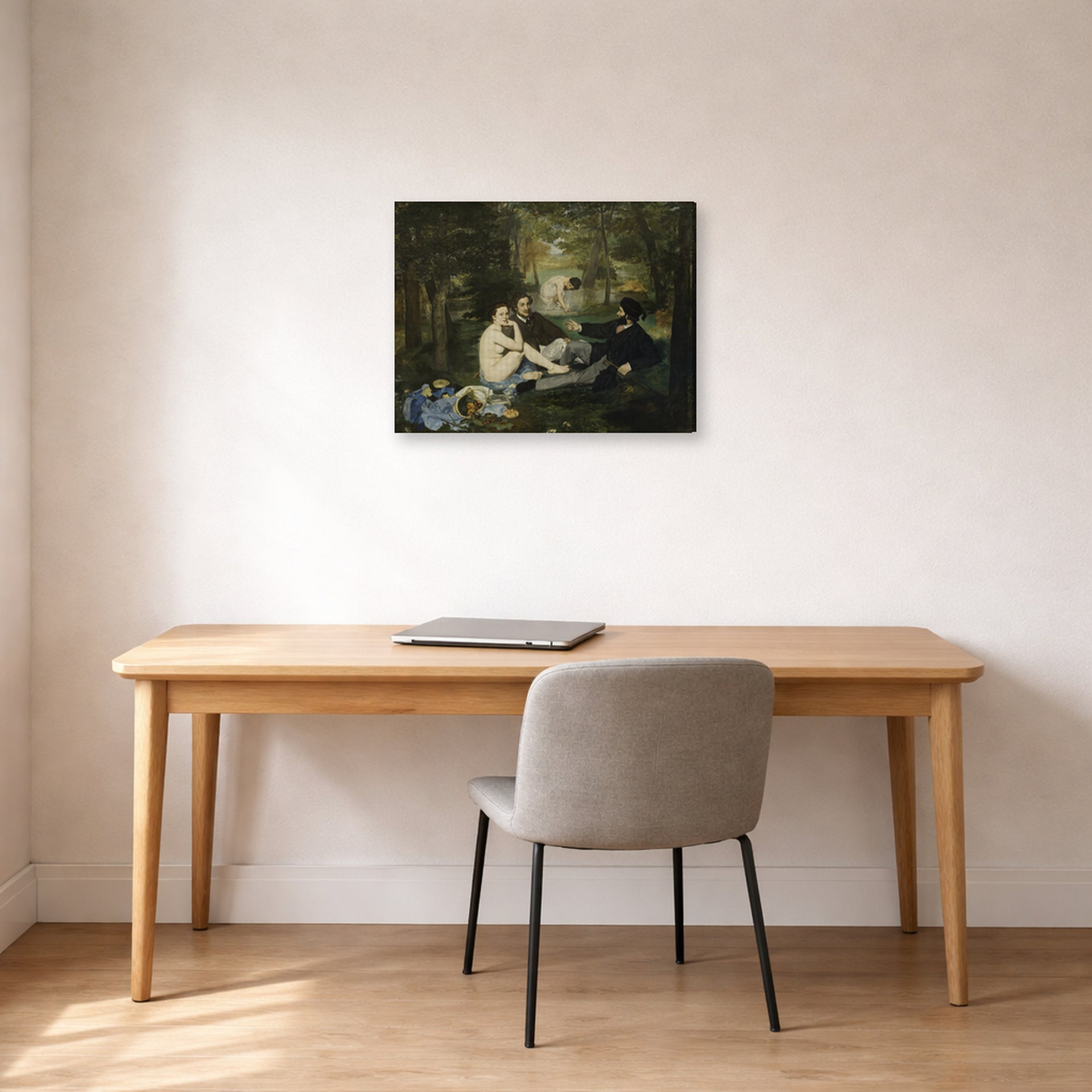 Gallery-wrapped canvas print of Edouard Manet's 'Luncheon on the Grass' displayed on a wall in a home office