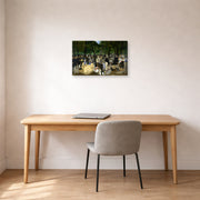 Gallery-wrapped canvas print of Edouard Manet's 'Music in the Tuileries Gardens' displayed on a wall in a home office