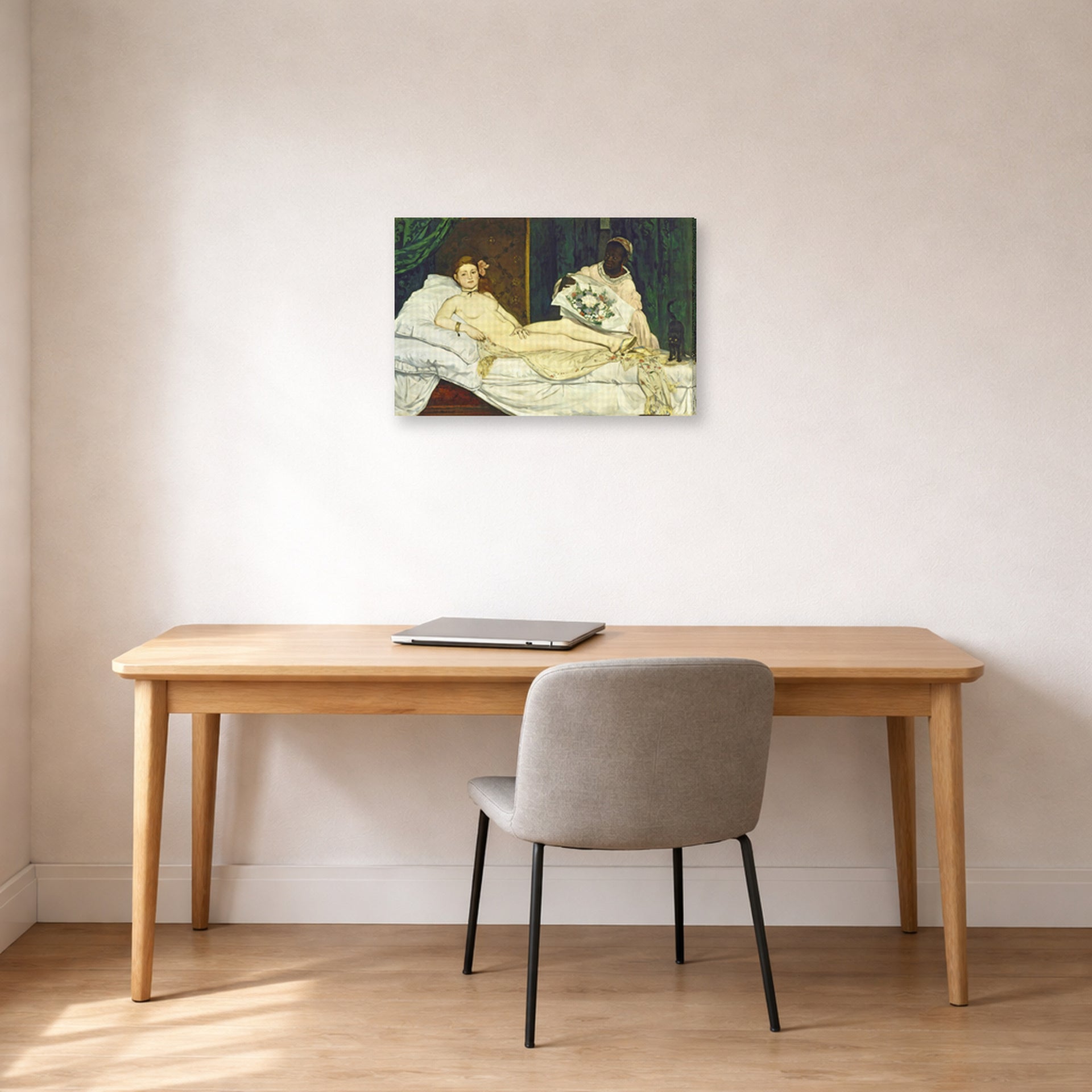 Gallery-wrapped canvas print of Edouard Manet's 'Olympia' displayed on a wall in a home office