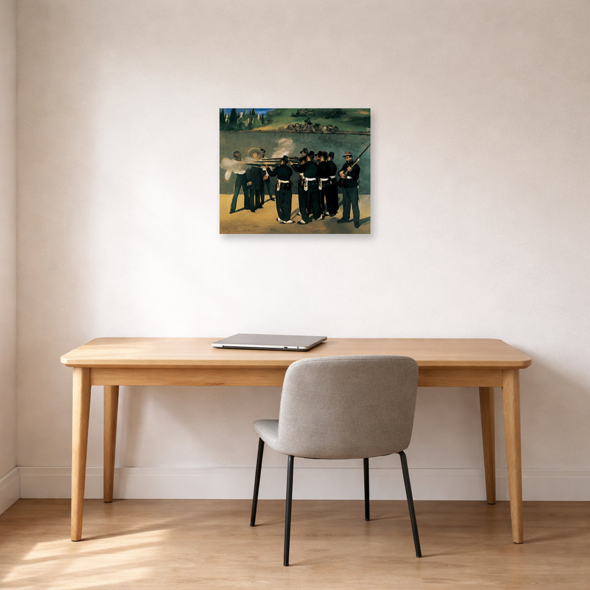 Unframed poster print of Edouard Manet's 'The Execution of Emperor Maximilian' displayed on a wall in a home office