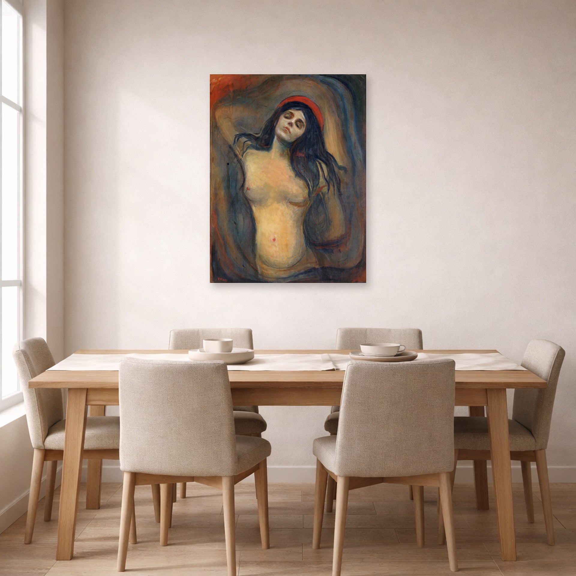 Unframed poster print of Edvard Munch's Madonna displayed on a wall in a dining room