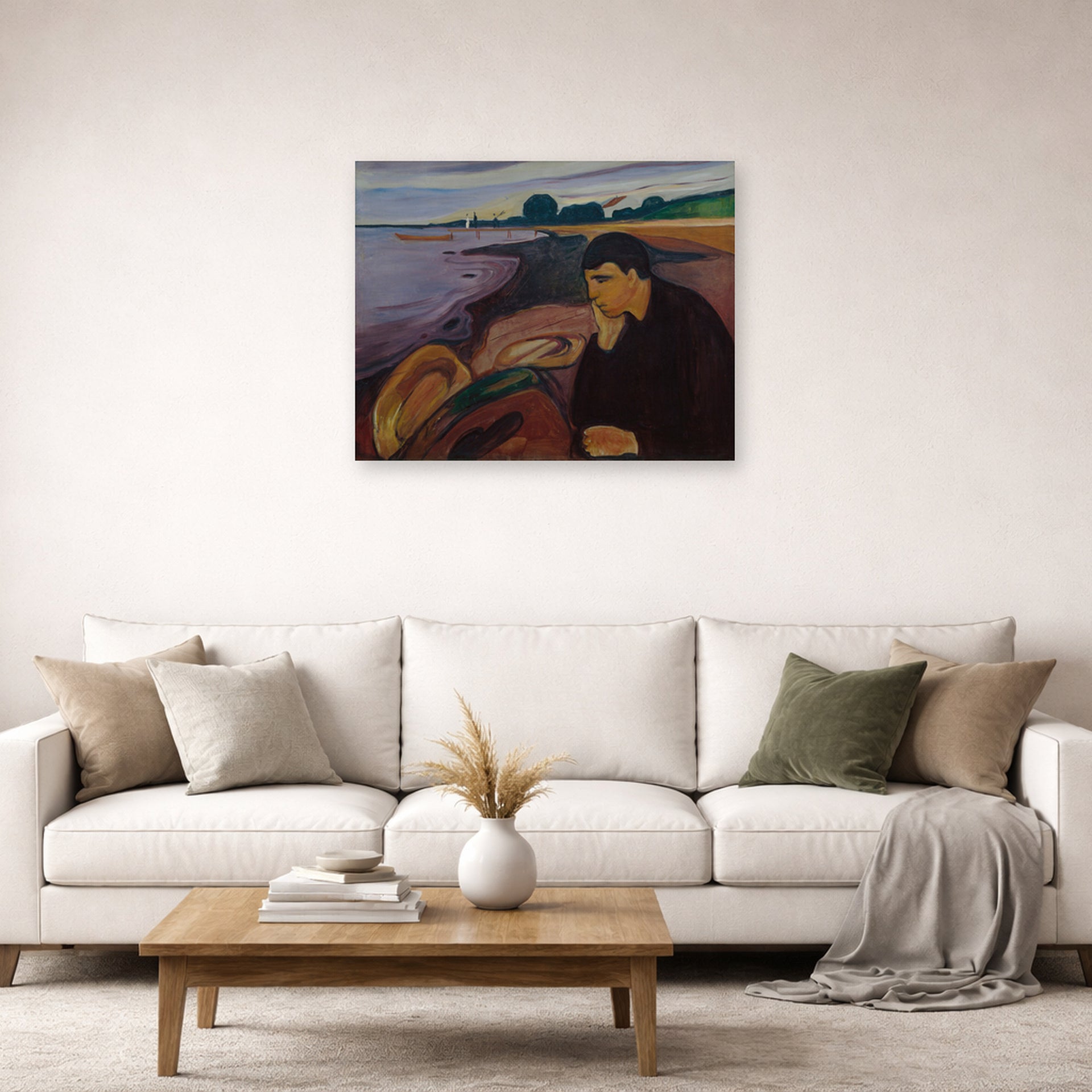 Unframed poster print of Edvard Munch's Melankoli displayed on a wall in a living room