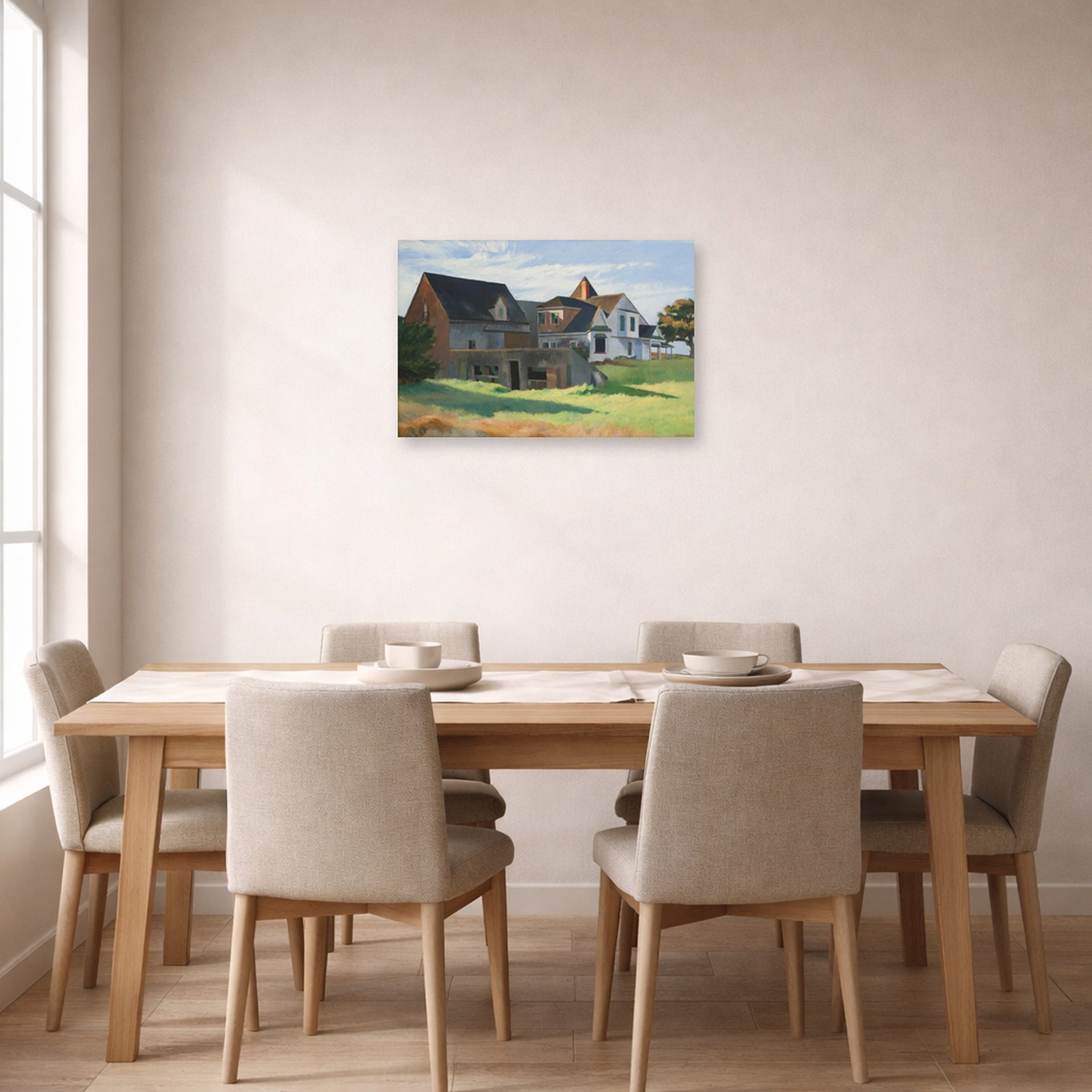 Unframed poster print of Edward Hopper's 'Cape Cod Afternoon' displayed on a wall in a dining room
