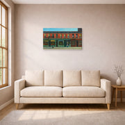 Gallery-wrapped canvas print of Edward Hopper's 'Early Sunday Morning' displayed on a wall in a living room (image 1 of 2)