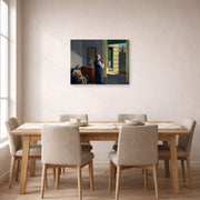 Gallery-wrapped canvas print of Edward Hopper's 'Hotel by a Railroad' displayed on a wall in a dining room