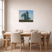 Unframed poster print of Edward Hopper's 'The House by the Railroad' displayed on a wall in a dining room