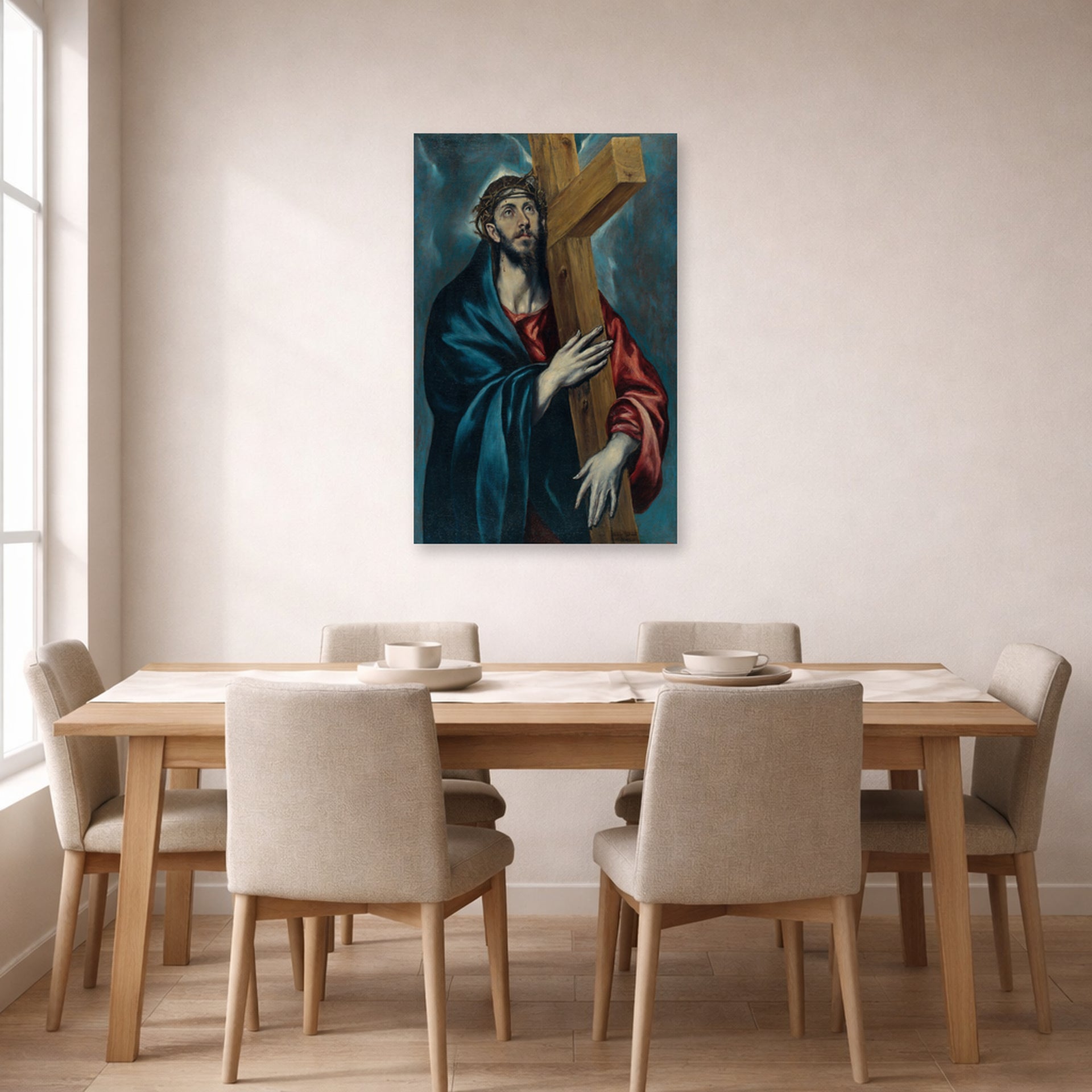 Unframed poster print of El Greco's Christ Carrying The Cross displayed on a wall in a dining room