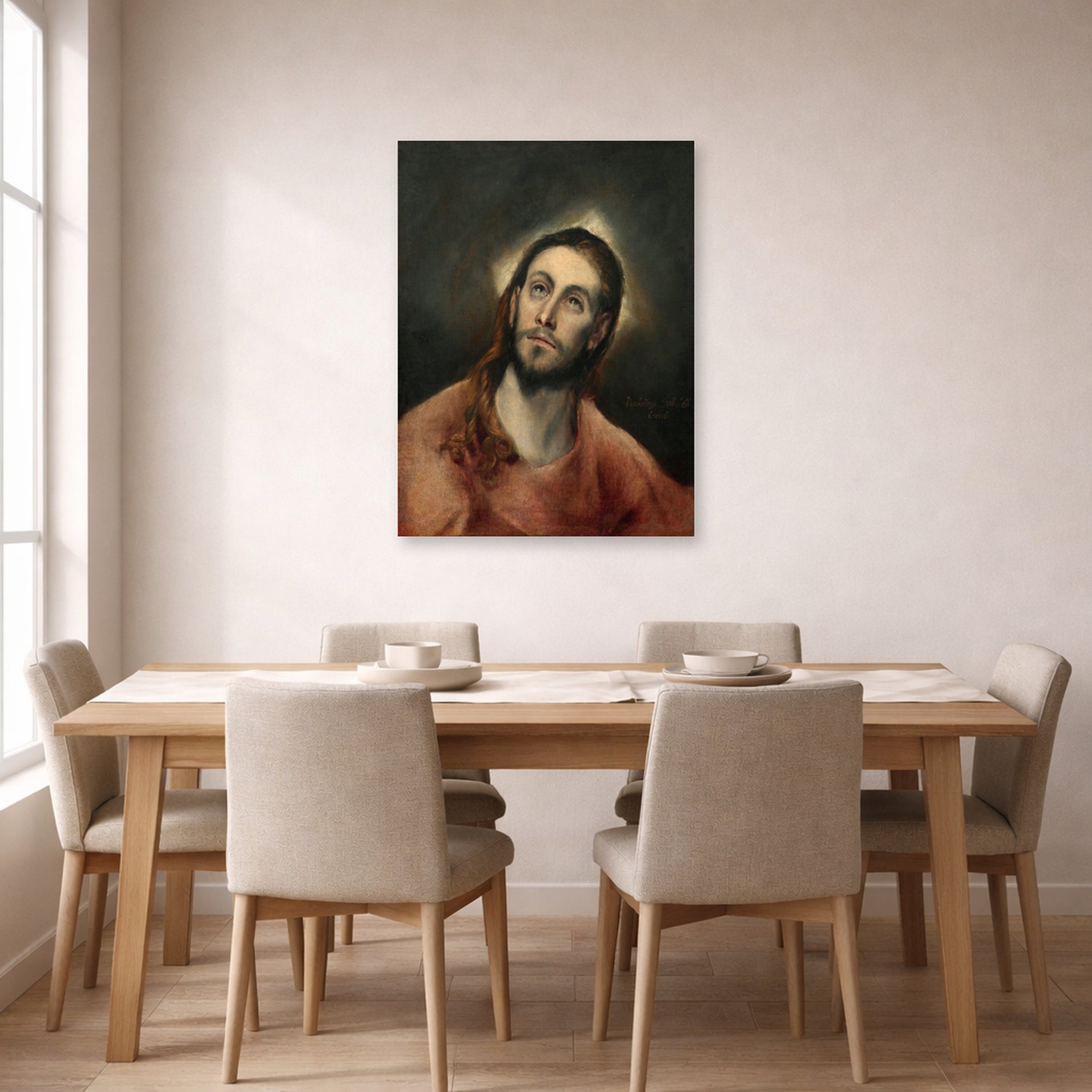 Unframed poster print of El Greco's Christ in Prayer displayed on a wall in a dining room
