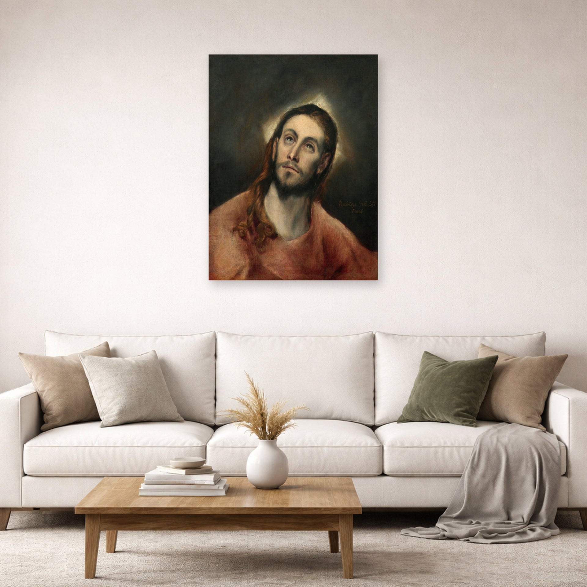 Unframed poster print of El Greco's Christ in Prayer displayed on a wall in a living room