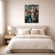 Gallery-wrapped canvas print of El Greco's Holy Family displayed on a wall in a bedroom