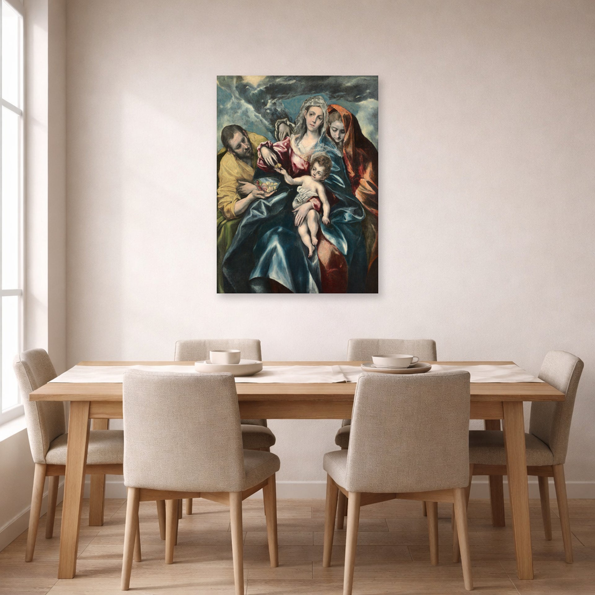 Unframed poster print of El Greco's Holy Family displayed on a wall in a dining room