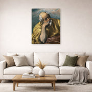 Unframed poster print of El Greco's Saint Joseph displayed on a wall in a living room