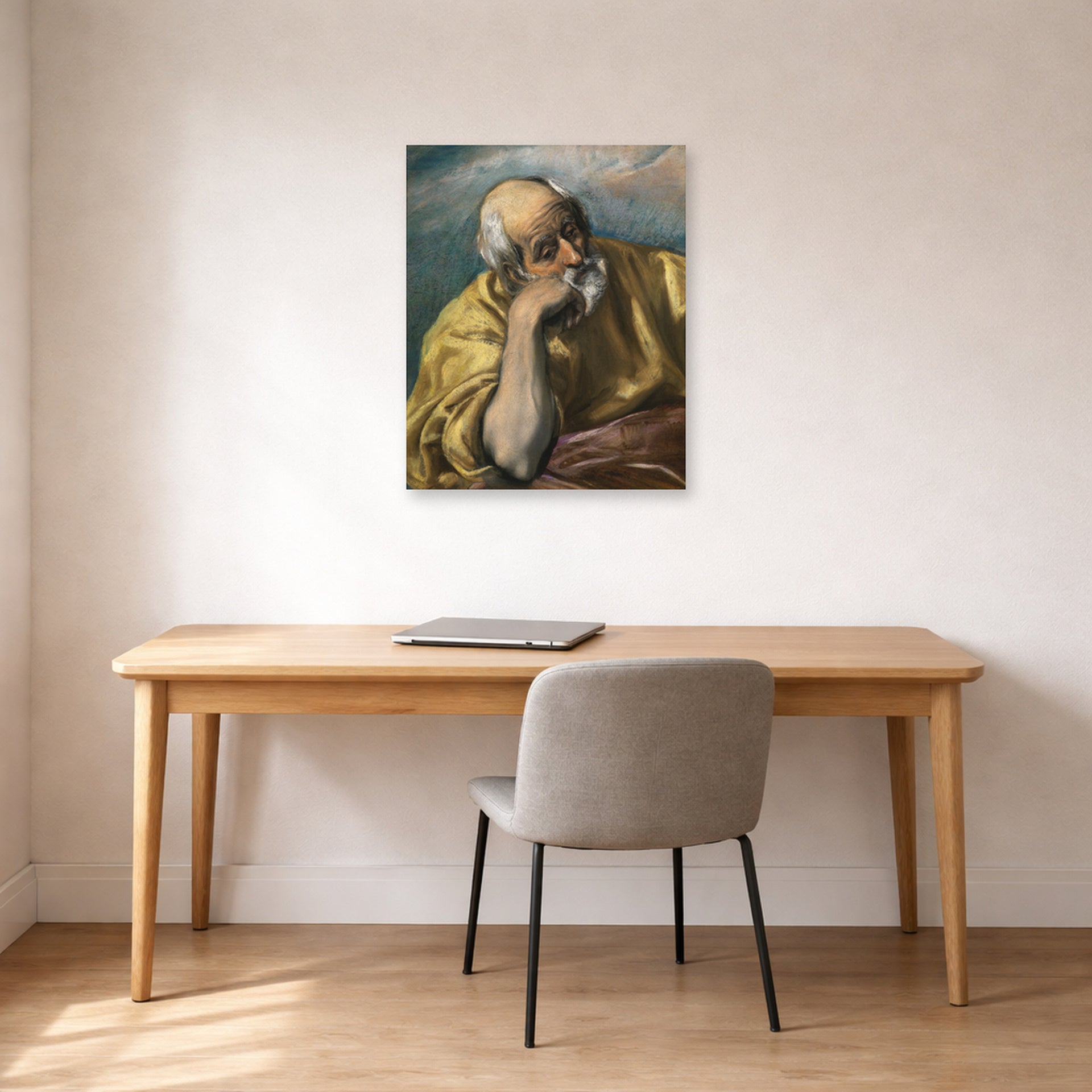 Unframed poster print of El Greco's Saint Joseph displayed on a wall in an office