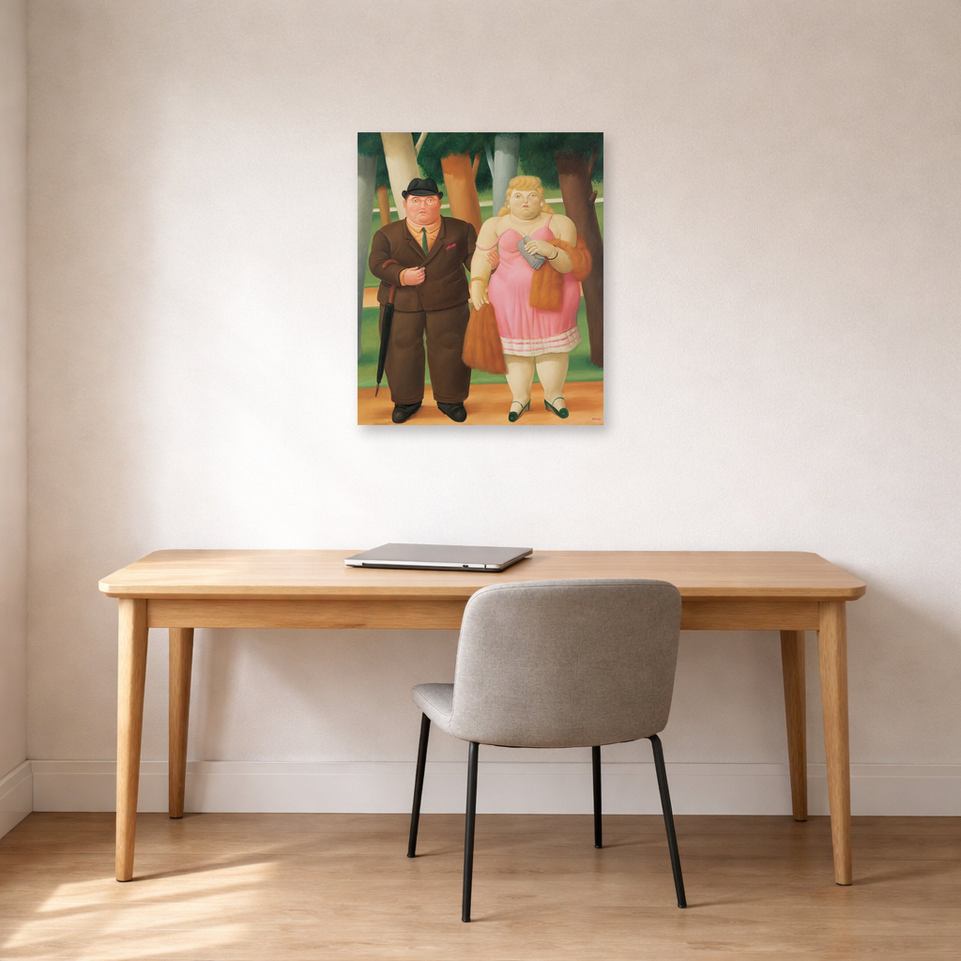 Unframed poster print of Fernando Botero's A Couple displayed on a wall in a home office