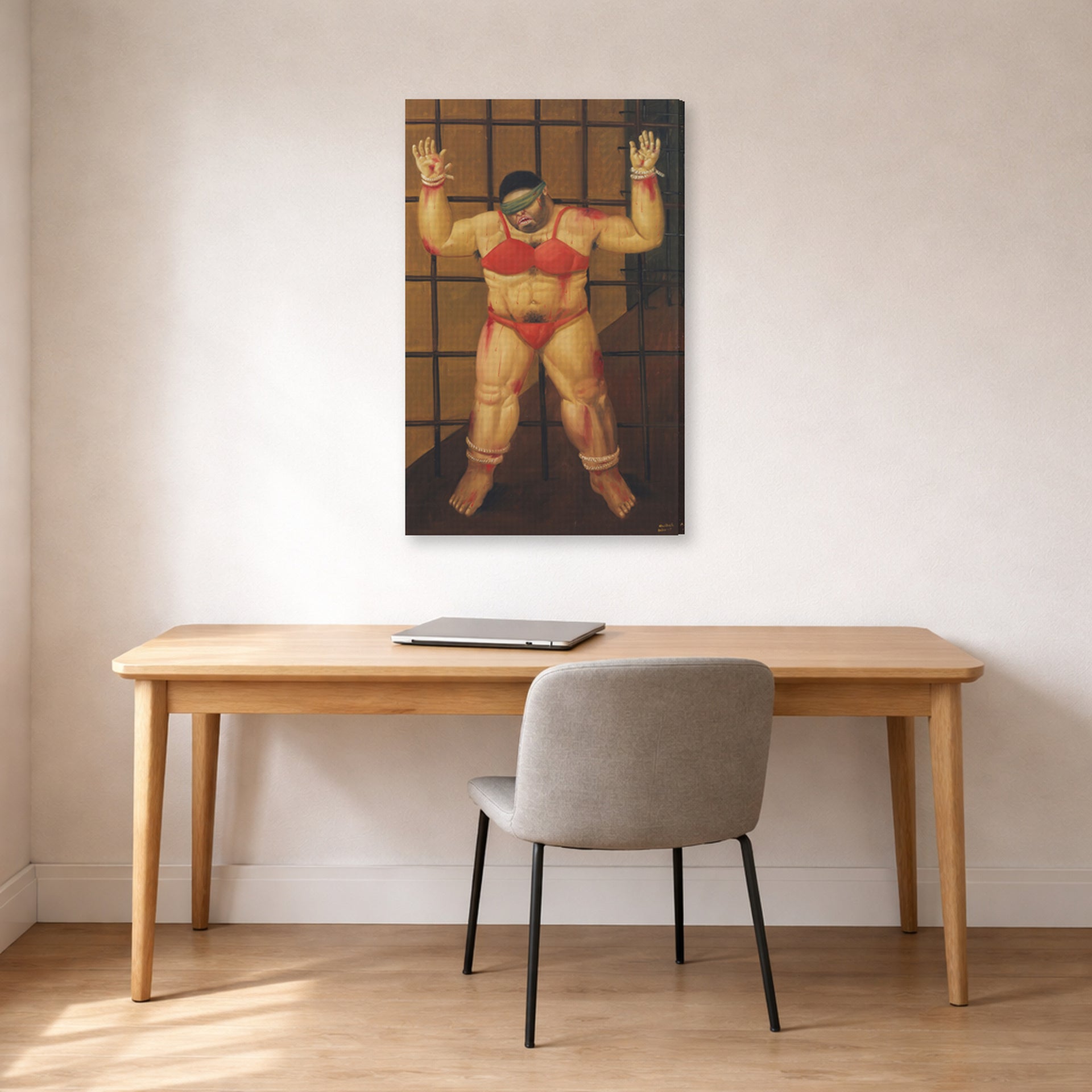 Gallery-wrapped canvas print of Fernando Botero's Abu Ghraib displayed on a wall in a home office