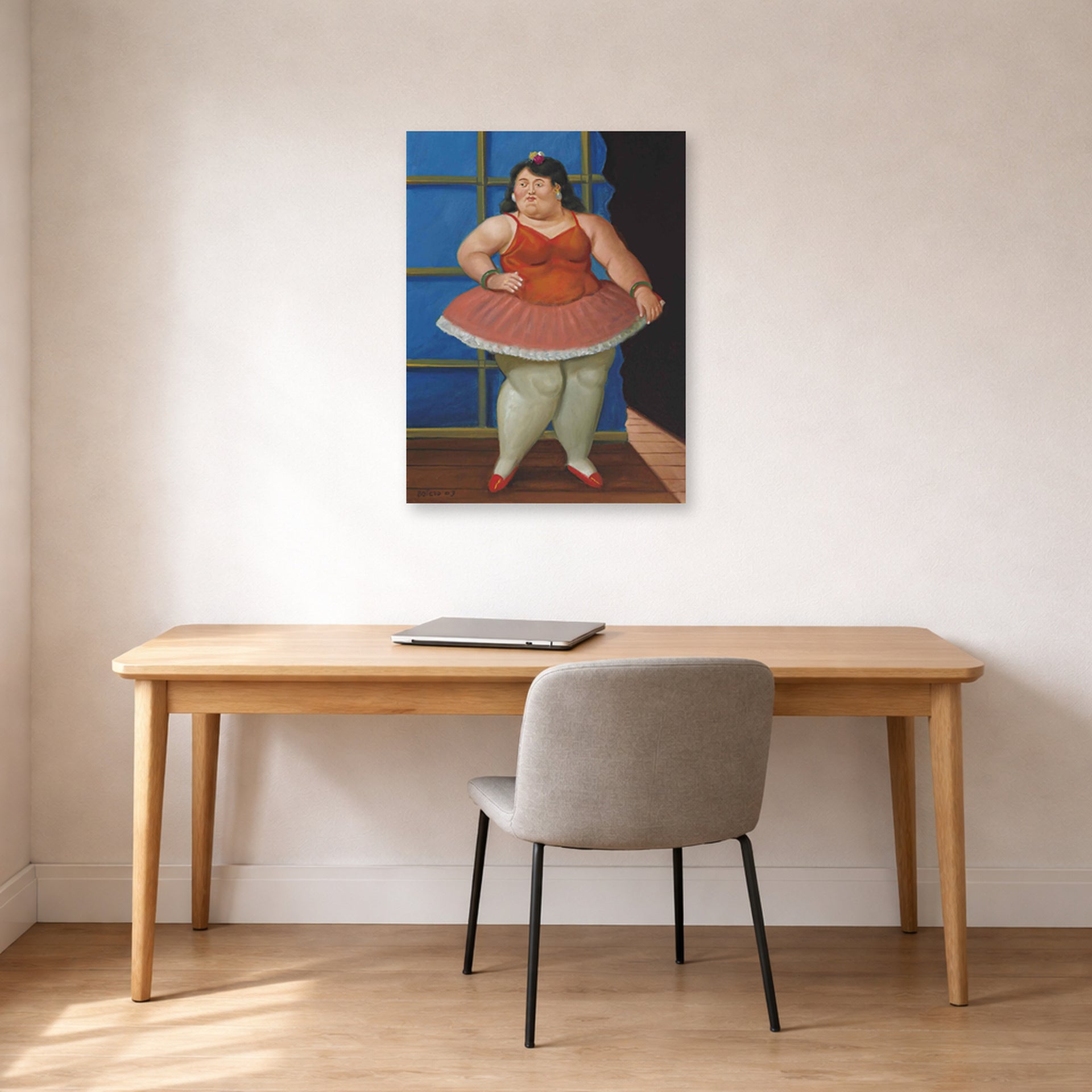 Unframed poster print of Fernando Botero's Ballerina displayed on a wall in a home office