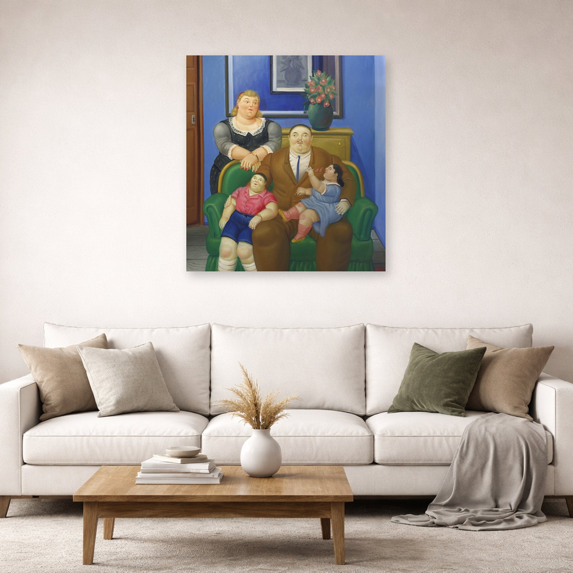 Unframed poster print of Fernando Botero's Family (1995) displayed on a wall in a living room