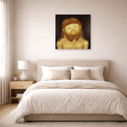 Gallery-wrapped canvas print of Fernando Botero's Head of Christ displayed on a wall in a bedroom