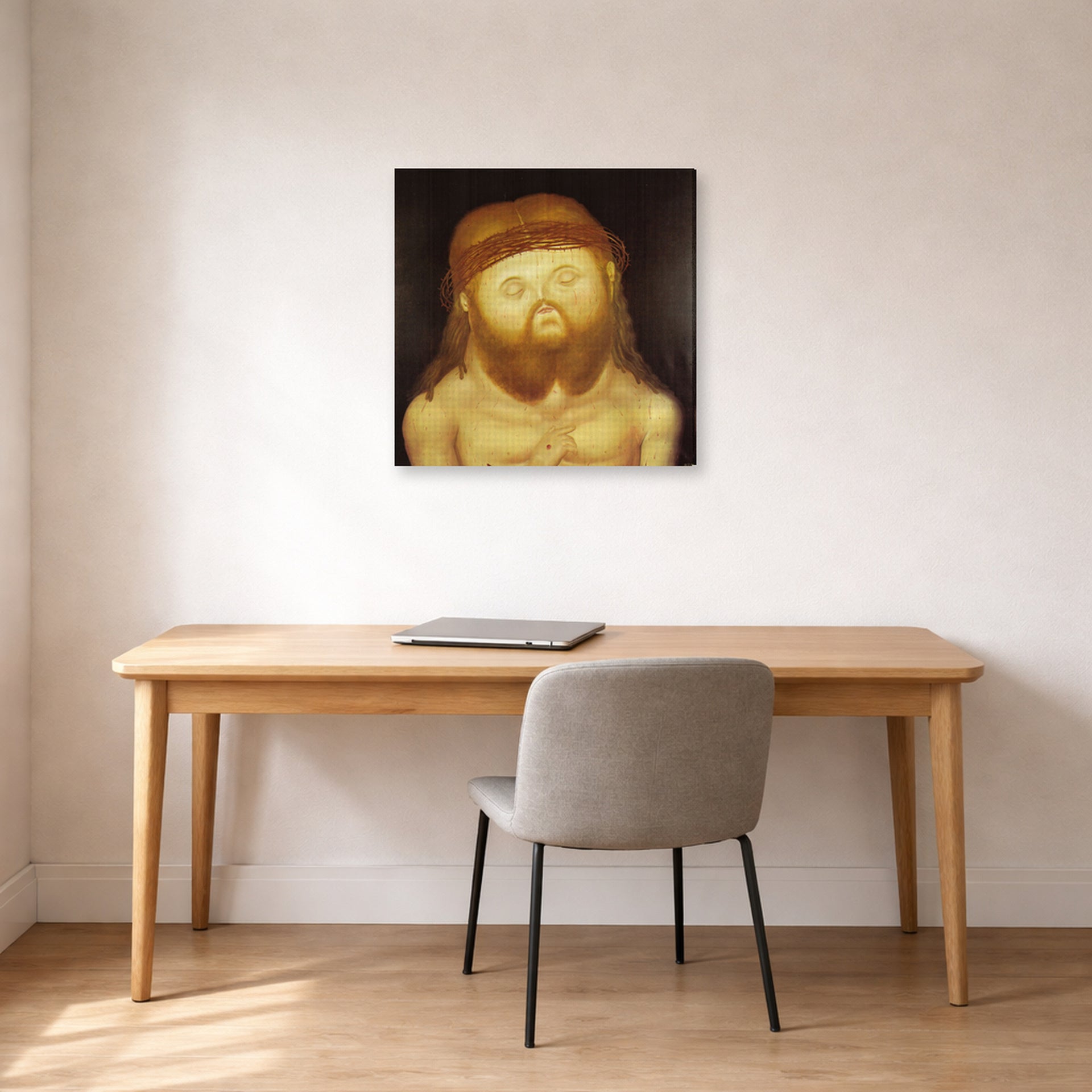 Gallery-wrapped canvas print of Fernando Botero's Head of Christ displayed on a wall in a home office