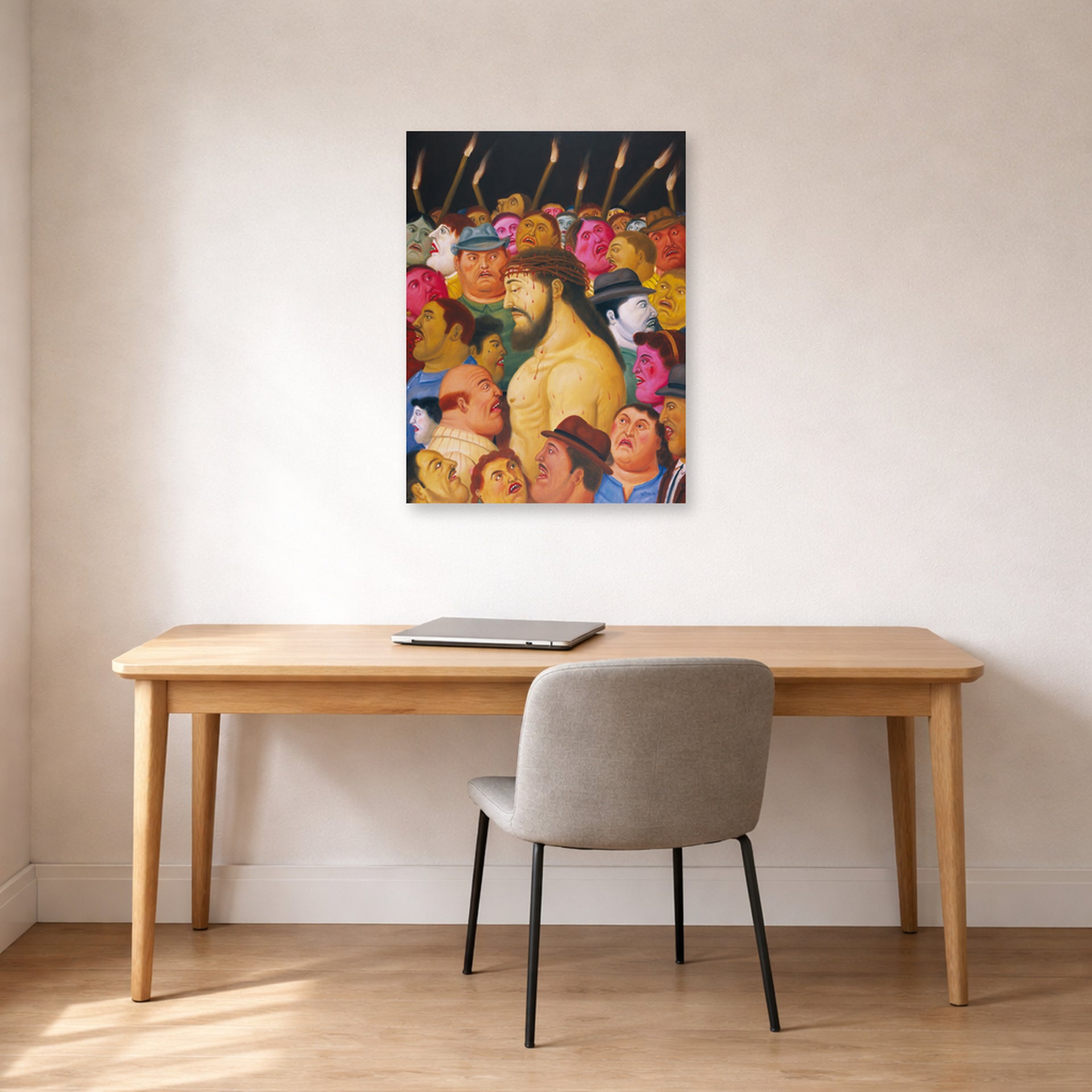 Unframed poster print of Fernando Botero's Jesús y la multitud displayed on a wall in a home office