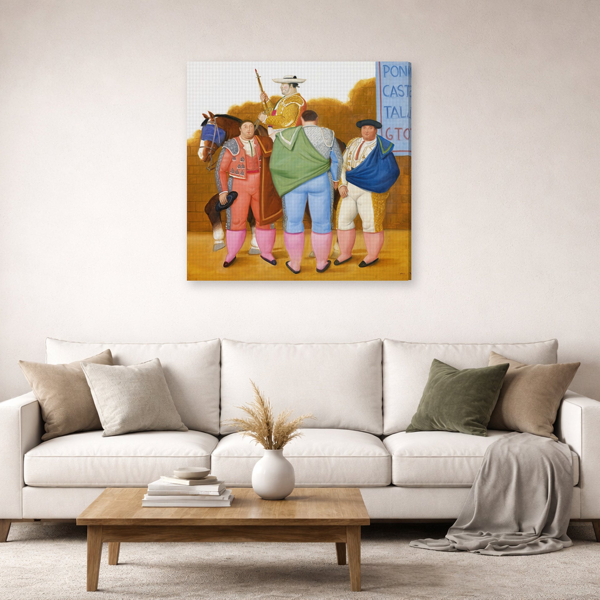 Gallery-wrapped canvas print of Fernando Botero's La Cuadrilla displayed on a wall in a living room