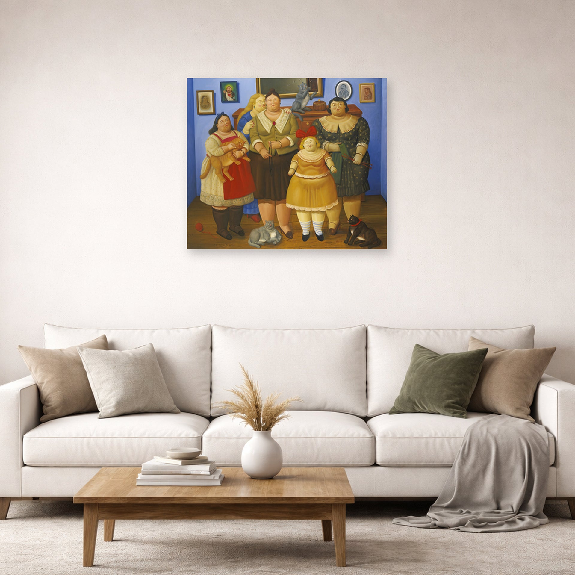 Unframed poster print of Fernando Botero's Le Sorelle displayed on a wall in a living room